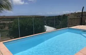 Jolie Villa créole vue mer et piscine dans le sud