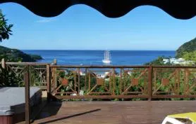 Loue villa bois 4 chambres et spa avec vue  panoramique sur la baie de deshaies