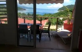 Magnifique bungalow  neuf vue mer dans un jardin tropical
