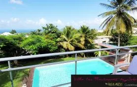 Villa Flamboyants de Sofaïa  avec piscine dans un jardin tropical, superbe vue mer