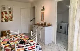 La maison de la plage, pieds dans l'eau