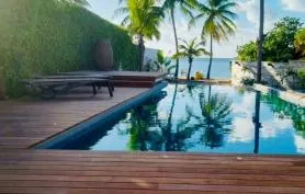 Villa luxe bord lagon adossée au golf de St François Guadeloupe 12 pers, classée 5 étoiles *****