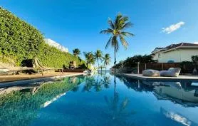 Villa luxe bord lagon adossée au golf de St François Guadeloupe 12 pers, classée 5 étoiles *****