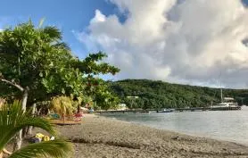 La maison de la plage, pieds dans l'eau