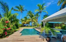 Villa Moana, vue sur l'océan, piscine, cocoteraie, accès direct à la plage