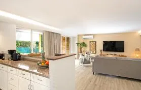 A 2 pas de la Plage de la Baie Orientale, superbe appart 2 chambres avec jardin privatif