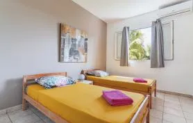 Courbaril appart 75m² Vue Mer & Piscine accès direct plage