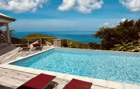 Lodge Orchidée - Ver Mer - Jacuzzi Privatif - Accès Piscine - Lit en 180x200 - Clim - Proche des commodités et des plages - Anses d'Arlet - Table d'hôtes