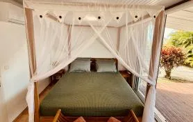 Lodge Orchidée - Ver Mer - Jacuzzi Privatif - Accès Piscine - Lit en 180x200 - Clim - Proche des commodités et des plages - Anses d'Arlet - Table d'hôtes