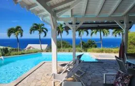 Villa Tifle avec piscine privée, vue mer, proche plage