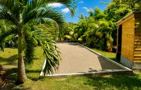Les Palmiers – Bungalow Créole au cœur d’un jardin tropical