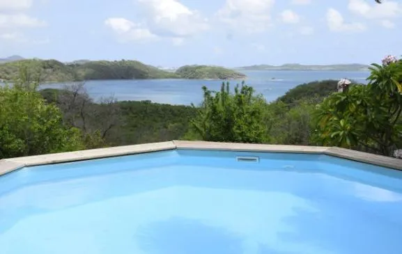 Jolie villa T4 en lisière de parc naturel avec magnifique vue mer au Robert