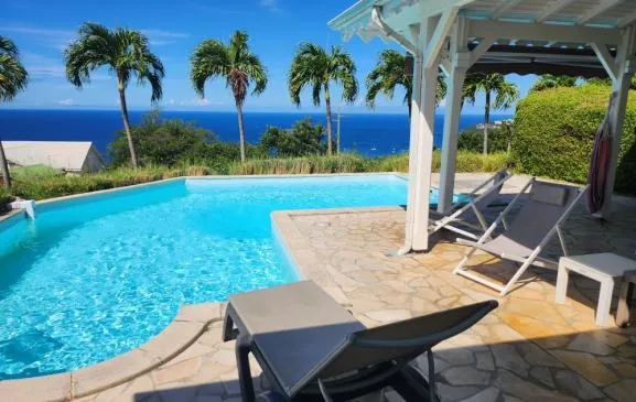 Villa Tifle avec piscine privée, vue mer, proche plage
